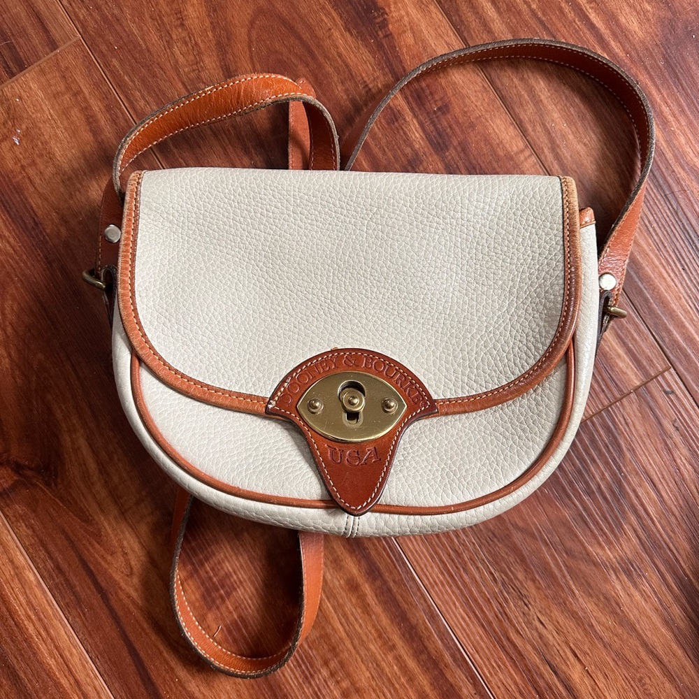 Dooney & Bourke Cream Leather Crossbody with Tan Trim and Brass Hardware